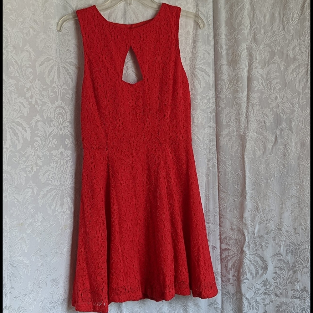 Red lacey dress keyhole cut out in front and back.